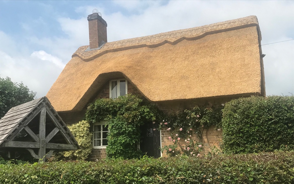 Thatched cottage in the countryside